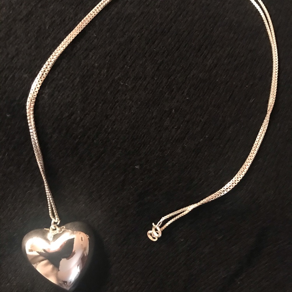 LargeSterling silver heart pendant.